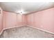 Finished basement area with a neutral carpet and paint at 3414 Ferncliff Ave, Indianapolis, IN 46227