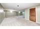 A finished basement with an updated color palette and new carpet flooring at 3414 Ferncliff Ave, Indianapolis, IN 46227