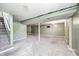 Unfinished basement featuring painted walls, concrete ceilings, and carpet flooring at 3414 Ferncliff Ave, Indianapolis, IN 46227