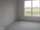 Unfinished bedroom with a large window featuring a view of green field at 3599 Hauser Ct, Bargersville, IN 46106