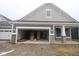 New construction features a two-car garage and stone accents on the gray exterior at 3599 Hauser Ct, Bargersville, IN 46106