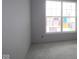 Well-lit bedroom with large windows, offering a blank canvas for your personal touch at 3611 Hauser Ct, Bargersville, IN 46106
