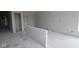Spacious room with unfinished walls and flooring, offering potential for customization at 3611 Hauser Ct, Bargersville, IN 46106
