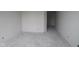 Large, open room with bare walls and concrete floor, perfect for customization to fit your needs at 3611 Hauser Ct, Bargersville, IN 46106