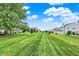 Beautifully maintained backyard with lush green grass and ample space at 3811 Tartan Trl, Whitestown, IN 46075