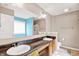Well-lit bathroom with double vanity, modern fixtures, and a separate shower at 3811 Tartan Trl, Whitestown, IN 46075