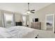 Bright main bedroom with high ceilings, modern furniture, and large windows for natural light at 3811 Tartan Trl, Whitestown, IN 46075