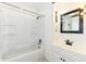 Clean bathroom featuring a tub with shower, white vanity, and updated fixtures at 402 E 4Th St, Sheridan, IN 46069