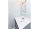 Bathroom featuring white vanity and sink with updated fixtures at 402 E 4Th St, Sheridan, IN 46069
