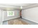 Bedroom with gray walls, window and a brown area rug at 402 E 4Th St, Sheridan, IN 46069