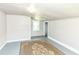 Bedroom with gray walls, window and a brown area rug at 402 E 4Th St, Sheridan, IN 46069