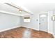 Finished bedroom featuring wood floors, a window, and a classic ceiling fan at 402 E 4Th St, Sheridan, IN 46069