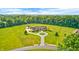 Expansive estate features a circular drive, detached garage, and mature landscaping at 4181 Whitetail Woods Dr, Bargersville, IN 46106