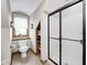 Bathroom featuring tiled floors, a toilet room, and a glass shower at 4181 Whitetail Woods Dr, Bargersville, IN 46106