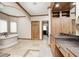 Bright bathroom featuring a soaking tub, granite counters and a walk in closet at 4181 Whitetail Woods Dr, Bargersville, IN 46106