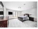 Spacious bedroom features natural light, carpet, and recessed lights at 4181 Whitetail Woods Dr, Bargersville, IN 46106