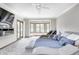 Comfortable primary bedroom featuring a ceiling fan, carpet, and sliding glass doors at 4181 Whitetail Woods Dr, Bargersville, IN 46106