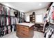 Spacious walk-in closet with custom shelving and storage solutions for organization at 4181 Whitetail Woods Dr, Bargersville, IN 46106