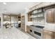 Gourmet kitchen features granite countertops, custom cabinets, and stainless steel appliances at 4181 Whitetail Woods Dr, Bargersville, IN 46106
