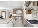 Gourmet kitchen featuring granite countertops, custom cabinets and stainless appliances at 4181 Whitetail Woods Dr, Bargersville, IN 46106