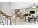 Open-concept space includes a well-equipped kitchen with a dining area and a cozy living room at 4181 Whitetail Woods Dr, Bargersville, IN 46106