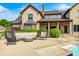 Relax on this cozy patio featuring comfortable outdoor seating, perfect for enjoying the landscaped backyard at 4181 Whitetail Woods Dr, Bargersville, IN 46106