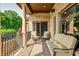 Relax on the covered patio with comfortable seating and enjoy the views of the landscaped backyard at 4181 Whitetail Woods Dr, Bargersville, IN 46106