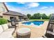 Wonderful pool and yard, with ample seating, perfect for entertaining on a hot summer day at 4181 Whitetail Woods Dr, Bargersville, IN 46106