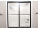 Close up of the shower with sliding glass doors at 4181 Whitetail Woods Dr, Bargersville, IN 46106