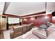 The home theater is equipped with plush leather recliners and a large projector screen at 4181 Whitetail Woods Dr, Bargersville, IN 46106