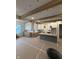 Kitchen featuring beams, kitchen island and unfinished cabinets and floors at 4295 Hamilton Run, Zionsville, IN 46077