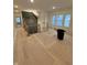 View of staircase leading to main room with large windows at 4295 Hamilton Run, Zionsville, IN 46077