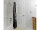 Bathroom featuring a tub and shower with a black floral shower curtain at 4718 Dancer Dr, Indianapolis, IN 46237
