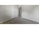 Bedroom featuring neutral walls, carpet, and a walk-in closet at 4718 Dancer Dr, Indianapolis, IN 46237