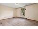 Spacious bedroom with neutral carpet, fresh paint, and a large window for ample natural light at 5380 Collett E Dr, Camby, IN 46113