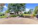 Backyard featuring decorative rocks, garden plants, and a small outbuilding at 5431 Nathan Pl, Indianapolis, IN 46237