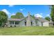Exterior view of home with a stone chimney at 5431 Nathan Pl, Indianapolis, IN 46237