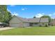 Charming single-story home with stone accents, attached garage, and well-maintained lawn in a desirable location at 5431 Nathan Pl, Indianapolis, IN 46237