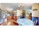 Open concept kitchen boasts eat-in dining and leads into living room with fireplace at 5431 Nathan Pl, Indianapolis, IN 46237
