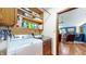 Laundry room with washer, dryer and storage shelves at 5431 Nathan Pl, Indianapolis, IN 46237