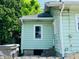 Back of house with siding, window, and utilities at 547 N Livingston Ave, Indianapolis, IN 46222
