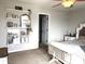 Light-filled bedroom with decorative shelving and a comfortable bed, creating a serene and inviting atmosphere at 5702 Deer Valley Ct, Columbus, IN 47201