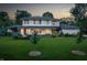 Stunning two-story home with a well-manicured lawn and elegant landscaping at 5946 Stafford Way, Indianapolis, IN 46228