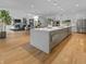 Modern kitchen with a spacious island, stainless steel appliances, and an open floor plan at 5946 Stafford Way, Indianapolis, IN 46228