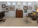 Cozy living room showcasing artwork, comfortable seating, and a glass coffee table at 5946 Stafford Way, Indianapolis, IN 46228