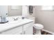 Cozy bathroom with a single sink vanity, updated faucet, and well-maintained features at 5966 Draycott Dr, Indianapolis, IN 46236