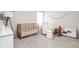 Cozy Bedroom with crib, rocking chair, and playful decor at 5966 Draycott Dr, Indianapolis, IN 46236