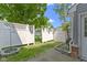 The back yard features a fire pit, grass, and a fence at 603 Daviess Dr, Westfield, IN 46074