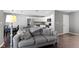 Inviting living room with modern decor seamlessly flows into the kitchen area with stainless steel appliances at 603 Daviess Dr, Westfield, IN 46074