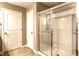Bathroom featuring a glass-enclosed shower and neutral finishes at 6114 Pebblebrooke Rd, Whitestown, IN 46075